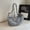 Light blue, variant on Shoulder Bag Crossbody Bag Dumpling Bag for Young Women Sewing Line Denim Medium Size Adjustable Strap Multiple Compartments Retro Casual Daily Commute Shopping Weekend Outing