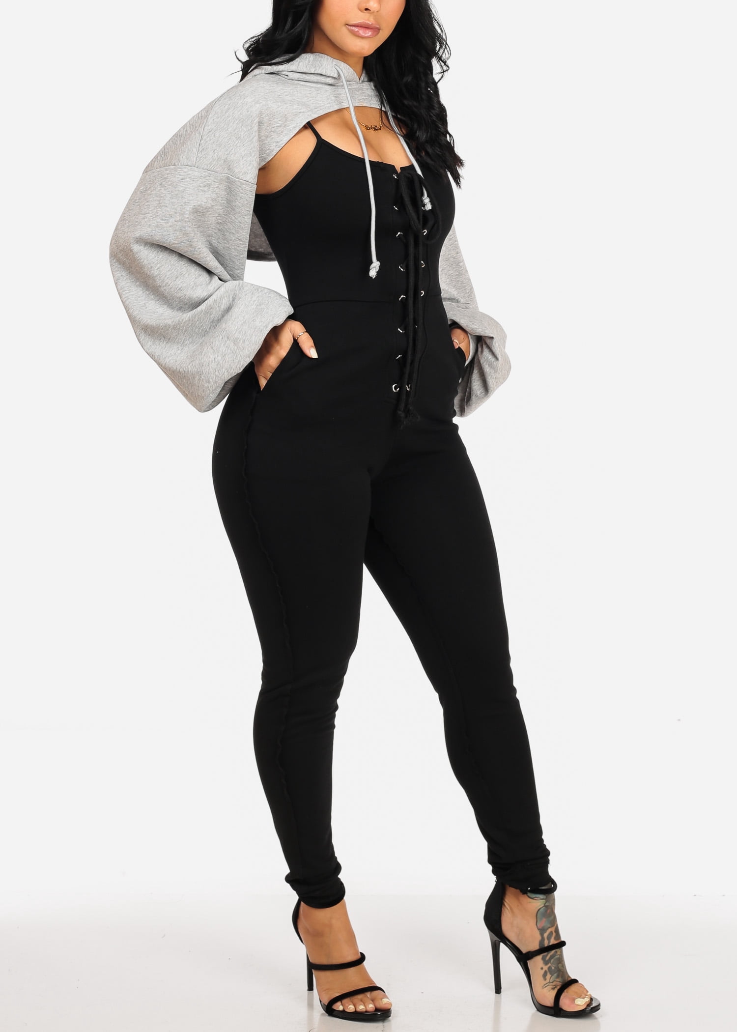 black jumpsuit with sweater