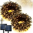 thumbnail image 1 of JMEXSUSS Paquete de 2 luces solares navideñas blancas, 100 LED de 42.7 pies luces solares al aire libre impermeables, 8 modos de alambre verde luces solares para árbol para decoración de Navidad, jard, 1 of 4