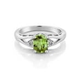 thumbnail image 2 of Gem Stone King 925 Sterling Silver Green Peridot and White Diamond 3 Stone Engagement Ring for Women | 1.40 Cttw | Oval 8X6MM | Round 2MM | Gemstone August Birthstone | Size 5, 2 of 5