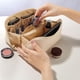 thumbnail image 4 of Paquete 100 piezas Cosmetiquera corporativa expandible de curpiel con asa beige 25 x 11 x 11, 4 of 7
