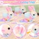 thumbnail image 4 of Juguete de conejito interactivo de peluche NINAOR con bolsa y accesorios, 4 of 7