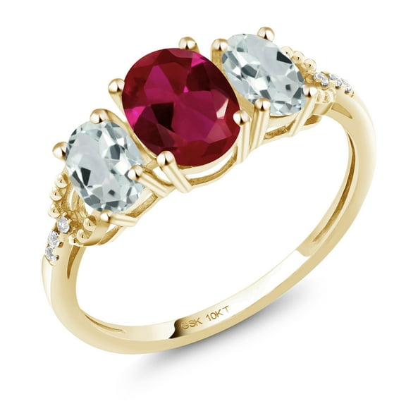 Gem Stone King 10K Yellow Gold Oval Red Created Ruby Sky Blue Aquamarine and Diamond 3-Stone Engagement Ring for Women (2.02 Cttw, Gemstone Birthstone, Size 9)
