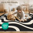 thumbnail image 4 of ODIKA 2'x3' Washable Samll Area Rug Black Cream Abstract Star and Wave Design Elegant Contrast with Fluid Lines Bold for Entryway, Kitchen, Laundry Room, Non-Slip, Low Pile, 4 of 7