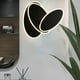 thumbnail image 4 of Aplique de pared LED creativo, giratorio 360 grados, moderno, acrílico. Negro ovalado, 4 of 6