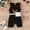 Black, variant on XDZJLR Girls Rompers Toddler Sleeveless Crewmecl Solid Color Print Ribbed Belt Waist Bag Outfit Black 9-12 Months