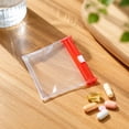 thumbnail image 2 of Iumwxz 7 Day Pill Organizer Pouches, Mini Reusable Waterproof Plastic Transparent Travel Storage Bags for Vitamins Supplements Small Items, Compact Size for Pocket Purse Backpack(Red,1 Piece), 2 of 7