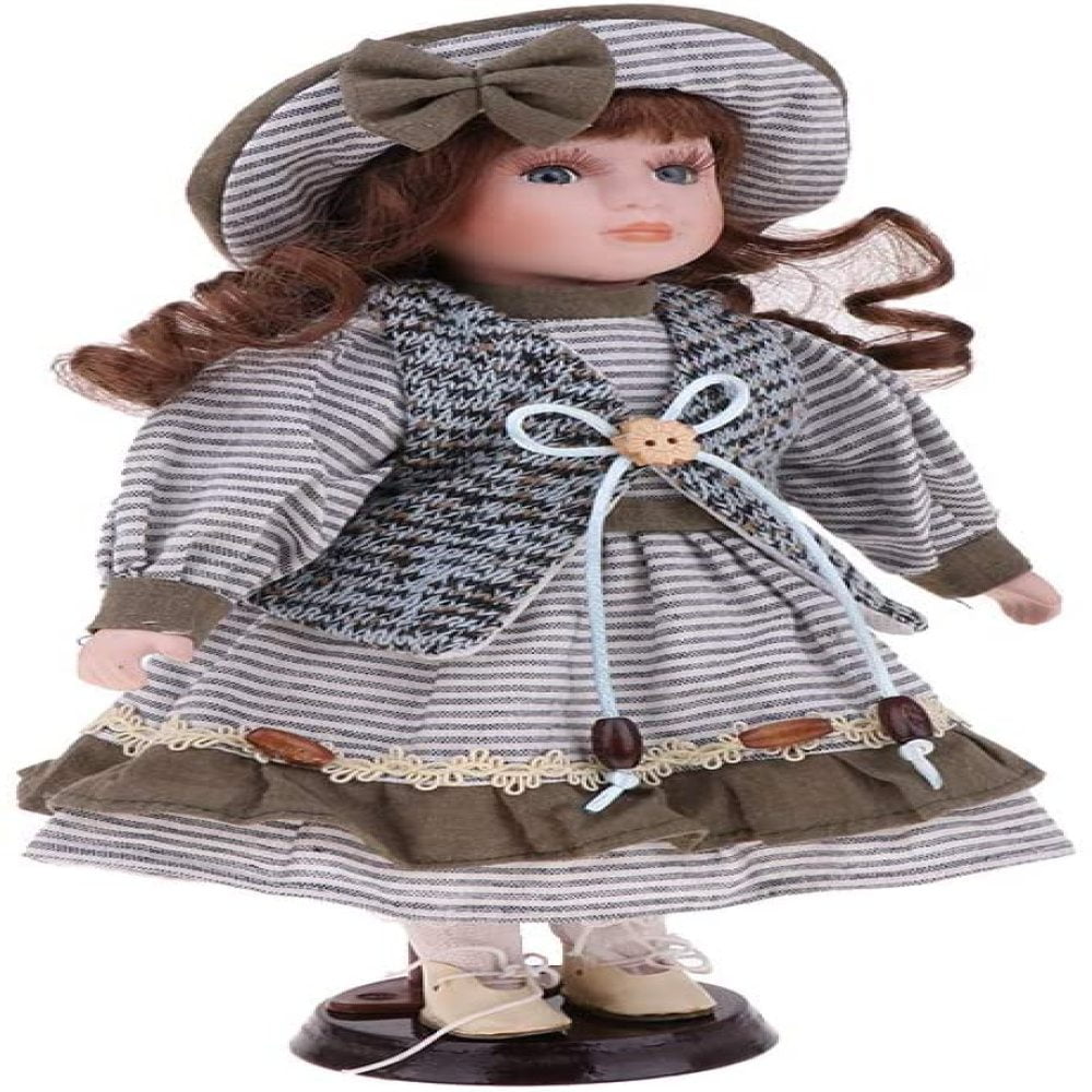 Porcelain doll collector's doll vintage with blue dressand about 30 cm tall Porcelain doll collector's doll vintage with blue dressand about 30 cm tall