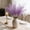 Purple, variant on Luxcidy Artificial Reeds Grass Flowers, Colorful Handmade Combination Of Seven-pronged Feathers, Peacock Grass Artificial Fireworks Decoration for Home Party (Red)
