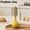 Red, variant on 2-in-1 Roly-Poly Peeler - Standing Kitchen Peeling Tool - Stainless Steel Upright Vegetable and Fruit Peeler - 1 Peeler - White