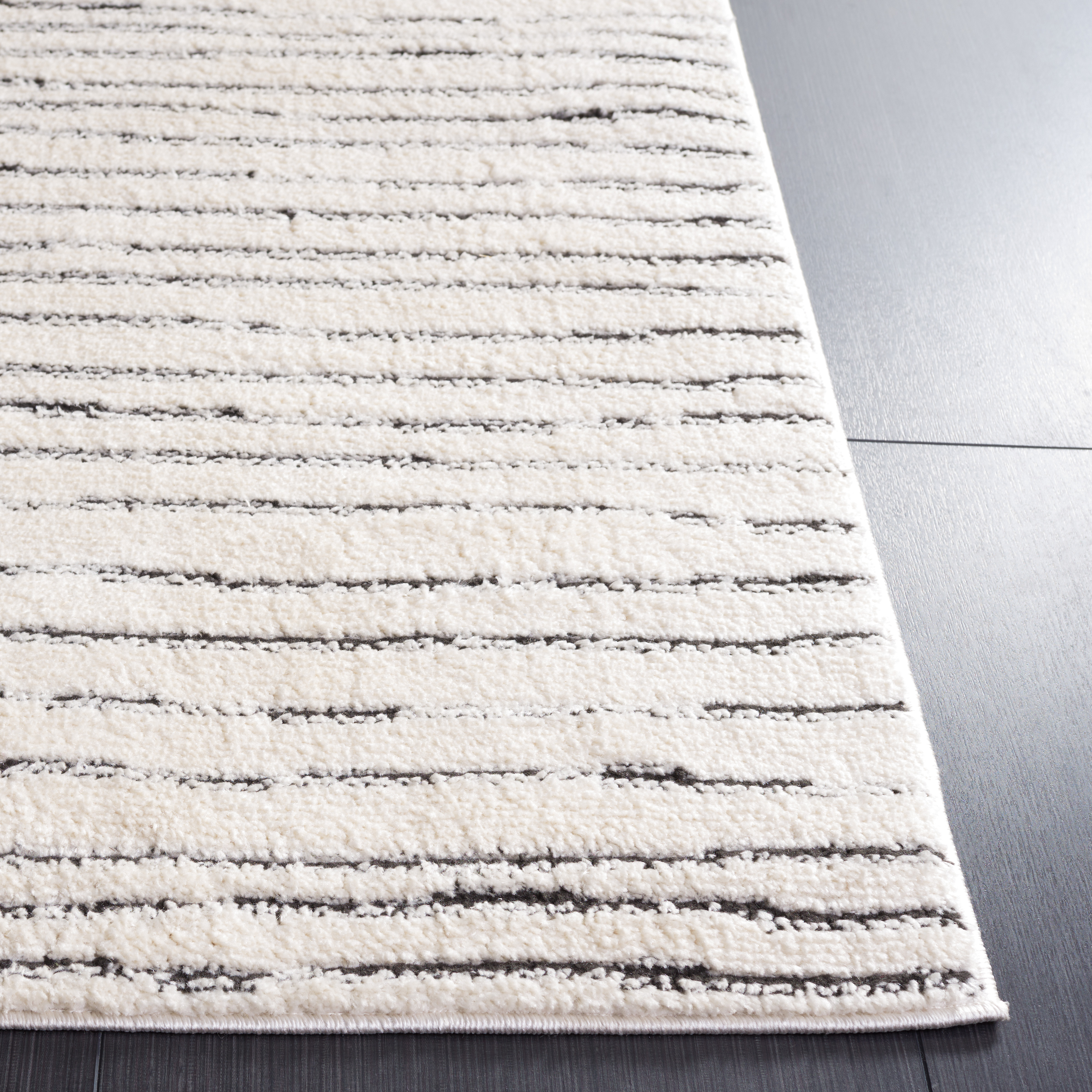 SAFAVIEH Melody Leo Abstract Polyester Runner Rug, Ivory/Black, 2'2" x 12'