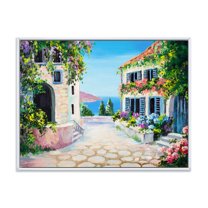 Designart 'Blossoming Flowers With White Houses With Near The Sea' Nautical & Coastal Framed Canvas Wall Art Print