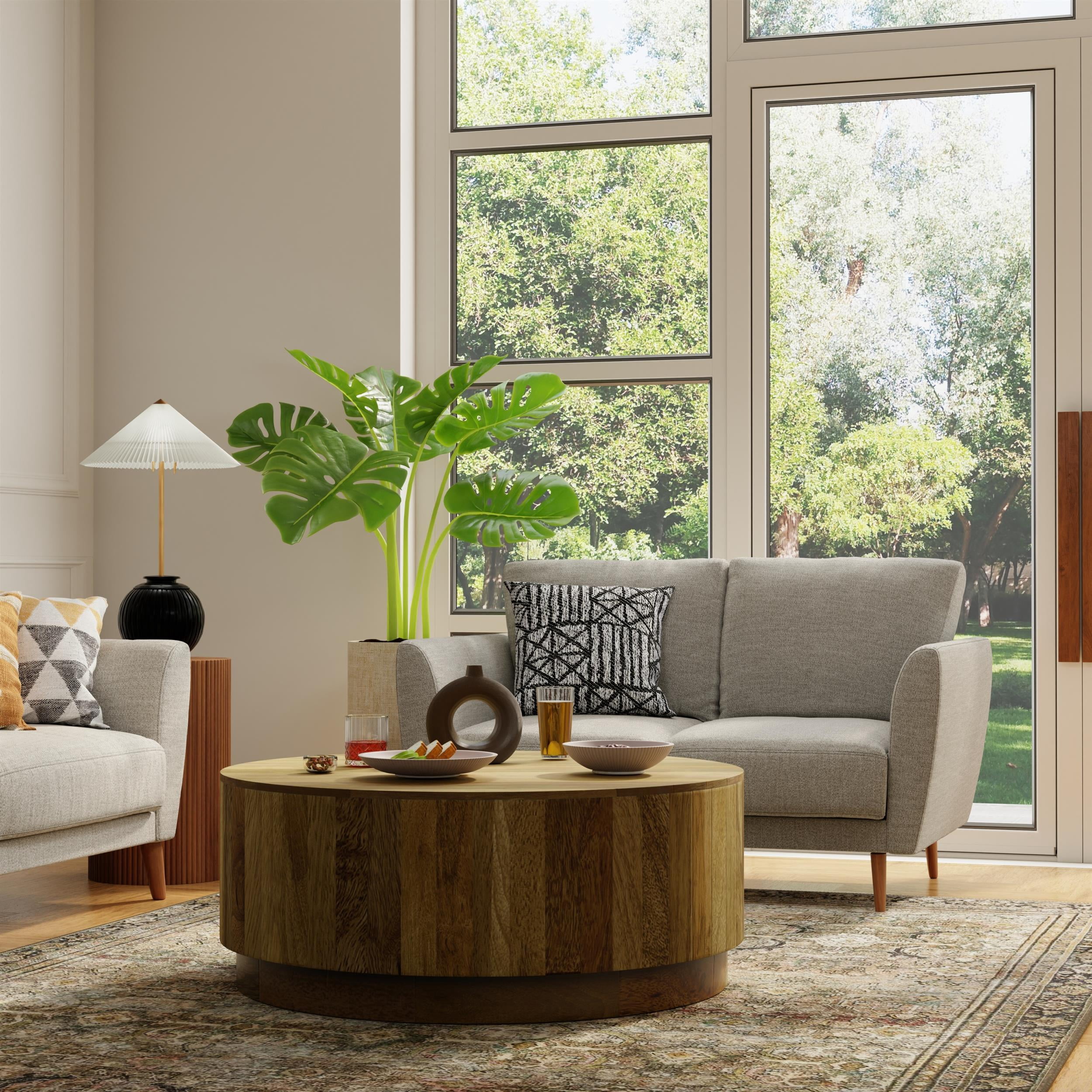 Carolina Classics Tamia 42" Round Wood Coffee Table in Natural Brown