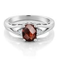 thumbnail image 2 of Gem Stone King 925 Sterling Silver Red Garnet and White Lab Grown Diamond 3 Stone Engagement Ring for Women | 1.61 Cttw | Oval Checkerboard 8X6MM | Round 2MM | Gemstone January Birthstone | Size 5, 2 of 4
