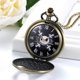 thumbnail image 2 of Reloj de bolsillo retro para hombres y mujeres con caja de calavera y collar con esfera de bronce antiguo, 2 of 5