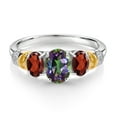 thumbnail image 2 of Gem Stone King 925 Sterling Silver and 10K Yellow Gold Oval Green Mystic Topaz Red Garnet and White Diamond 3 Stone Ring for Women (2.74 Cttw, Gemstone Birthstone, Size 5), 2 of 3
