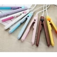 thumbnail image 1 of Mini plancha pare el cabello morada, 1 of 5