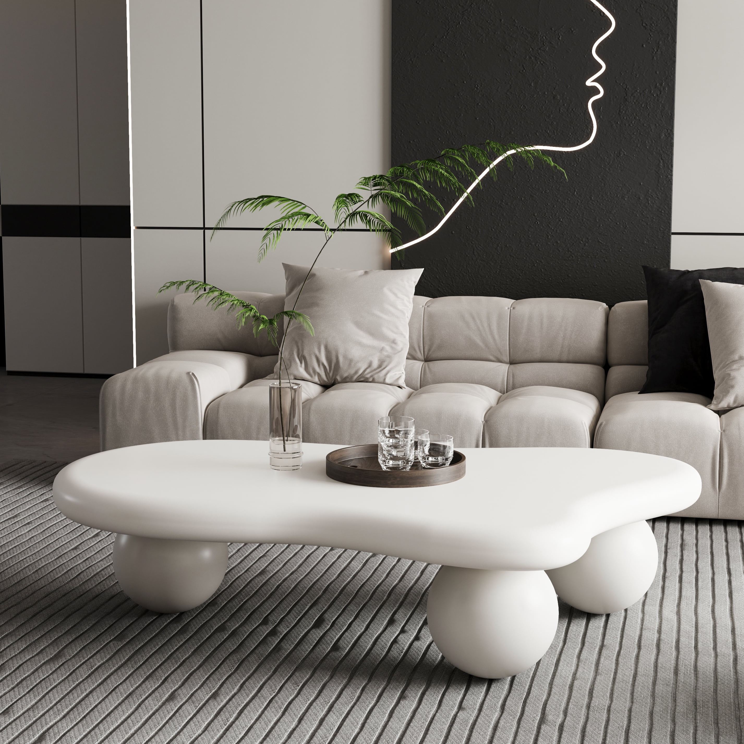 47 Inch Cloud Shaped Coffee Table with 3 Ball Legs for Living Room, Cream White