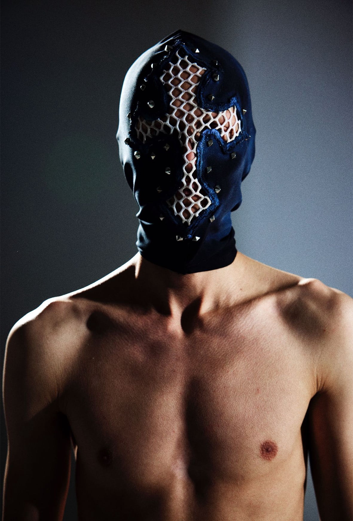 Bold Black Ski Mask and Balaclava  Featuring Central Cross Symbol and Metal Stud Details for Motorcycle, Snow, Skiing, and Nightclub Use
