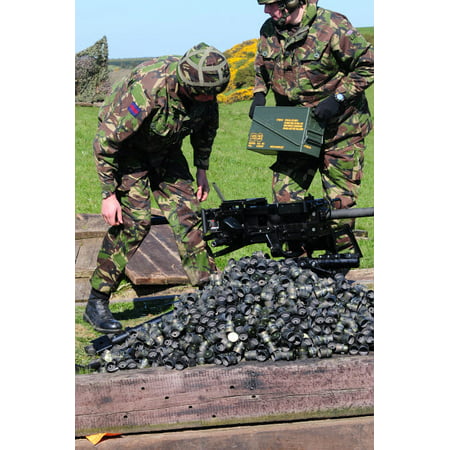 Guardsmen pick up empty brass casings from a live fire exercise Poster Print by Andrew ChittockStocktrek (Best Way To Clean Brass Casings)
