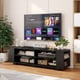 thumbnail image 2 of Mueble de TV Costway para televisor de hasta 65 pulgadas negro con Estantes ajustables, 2 of 4
