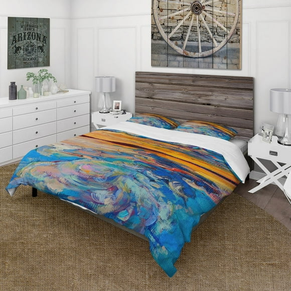 Designart 'Puesta de sol naranja sobre olas azules' Funda nórdica náutica y costera