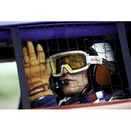 Paul Newman wearing a helmet and goggles in a racing car Photo (Best Way To Print Google Photos)