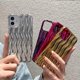 thumbnail image 5 of Funda para iPhone con diseño de ondas 3D y bordes rizados, de silicona suave, fina, a prueba de golpes (plateada brillante, iPhone 12/12 Pro), 5 of 8