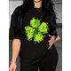 thumbnail image 1 of Camiseta con estampado de trébol del Día de San Patricio para mujer: estilo bohemio informal, cuello redondo y estampado de trébol verde vibrante. Camisetas informales., 1 of 8