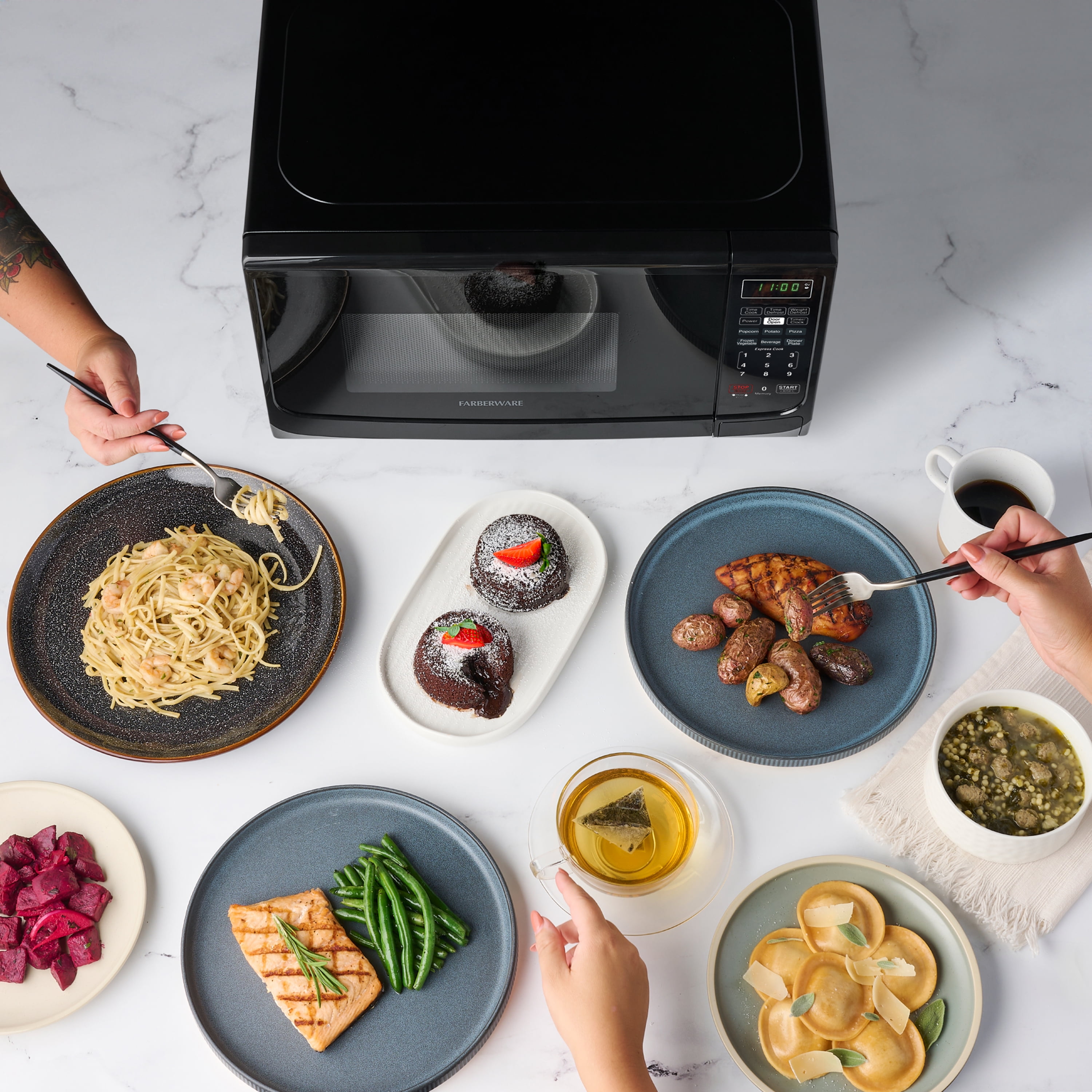 Farberware Countertop Microwave Oven with LED Lighting & Child Lock, 0.7 Cu Ft Black