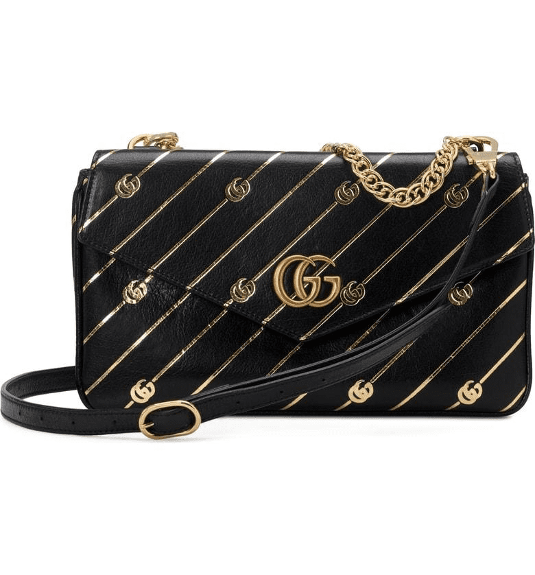 black and gold gucci purse