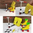 thumbnail image 3 of Vogacara Juego de 12 unidades de patinete de dedo de aleación para niños, Mini patinete de dedo, juguete interactivo para dedos, actividad sensorial, Juguetes amarillo Vogacara FN008347-01, 3 of 6