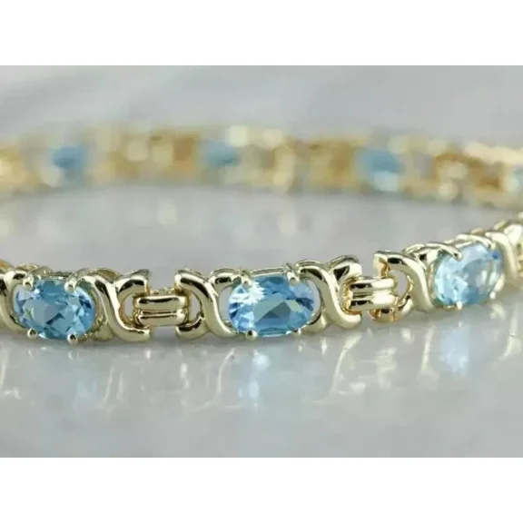 Beautiful Wedding 9Ct Oval Cut Simulated Blue Aquamarine Women's Tennis Bracelet 14K Yellow Gold Plated 925 Sterling Silver 7"