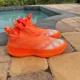 thumbnail image 2 of Adi - das N3Xt L3V3L Futurenatural Screaming Orange Men's Athletic Shoes FX3555, 2 of 6