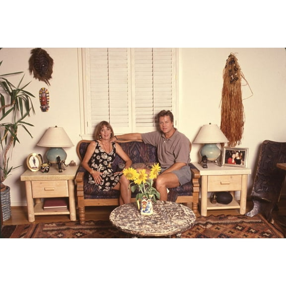 Brad Maule Sitting On Loveseat At Home With Wife Laverne Photo Print (16 x 20) - Item # CPA2029