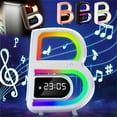 thumbnail image 1 of Altavoz de carga inalámbrica y despertador - altavoz Bluetooth 5-en-1 con luz nocturna que cambia de color, lámpara ambiental regulable y alarma de amanecer, 1 of 2