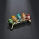 thumbnail image 5 of Broche creativo de aleación con forma de pájaro sentado en una rama, con diamantes de imitación, broche decorativo con aceite de goteo, insignia divertida para mujer, suministros de fiesta, 5 of 7