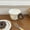 Brown, variant on This donut-shaped mug features a donut-shaped handle and is perfect for home décor, everyday use, parties, afternoon tea, latte art, and as a gift.