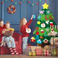 thumbnail image 3 of Juego de muñeco de nieve y árbol de Navidad de fieltro DIY - Paquete de 2 regalos de Navidad para niños - Árbol de Navidad de fieltro desmontable para colgar en la pared para niños pequeños Fason WMZY-833, 3 of 7