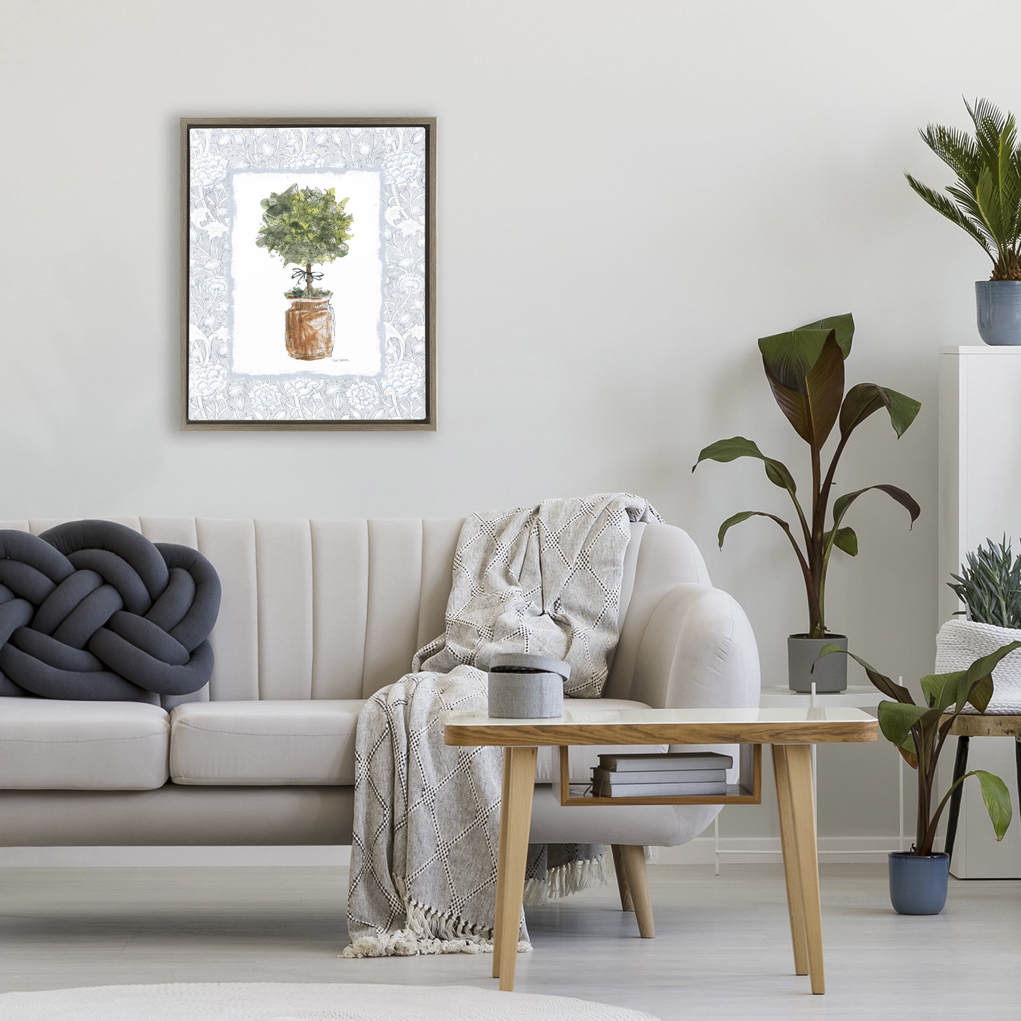 Stupell Industries Potted Topiary with Ribbon Brown Framed Floater Canvas Wall Art, design by Carol Robinson