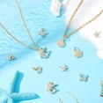 thumbnail image 4 of 1 caja de 10 colgantes de concha de 5 estilos, estrella de mar, micro pavé de circonita cúbica, de latón, con forma de delfín y océano., 4 of 9