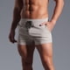 thumbnail image 4 of pstuiky Pantalones cortos de gimnasio para hombre, Pantalones cortos casuales de moda para hombre, de color liso, con bolsillo y cintura elástica. Pantalones cortos cargo, 4 of 7