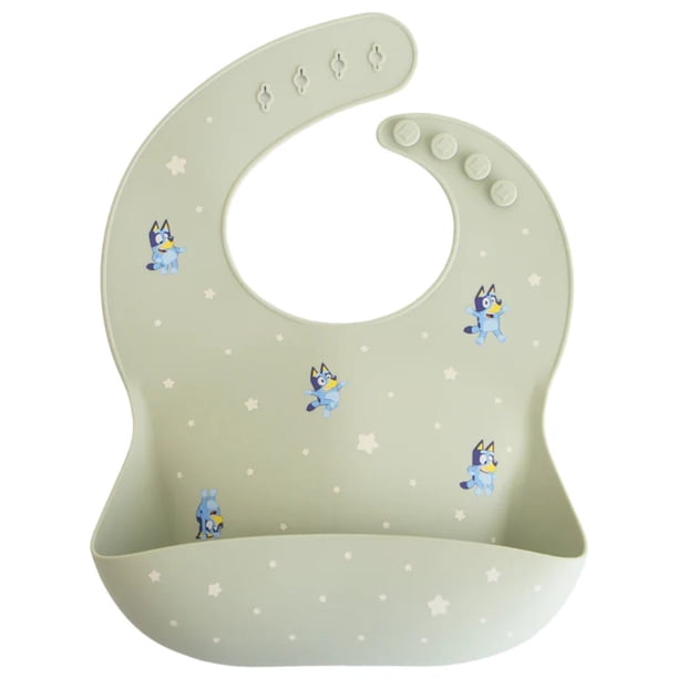 Babero de silicona para bebés Mushie Bluey Sage a partir de 4 meses con cierres en el cuello