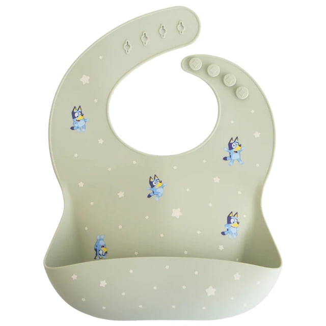 Babero de silicona para bebés Mushie Bluey Sage a partir de 4 meses con cierres en el cuello