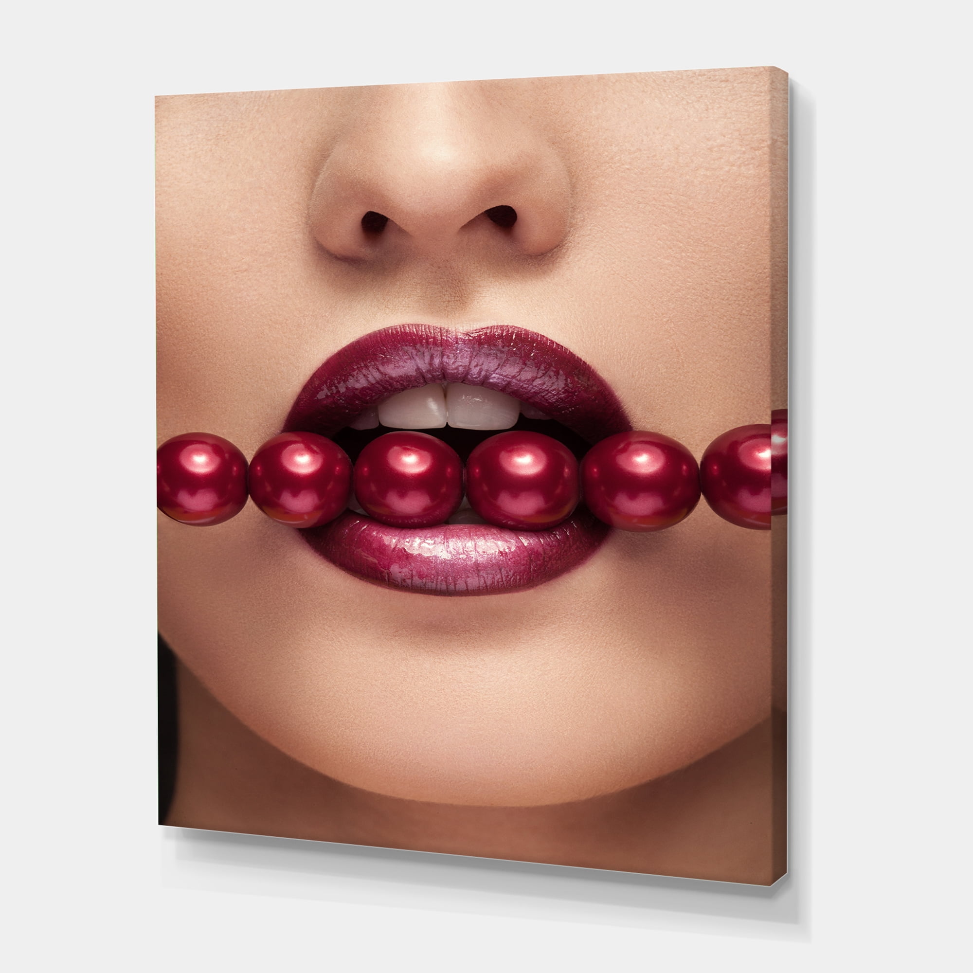 Designart ' Girl With Red Pearls In Mouth In A Sensual Pose ' Modern Canvas Wall Art Print