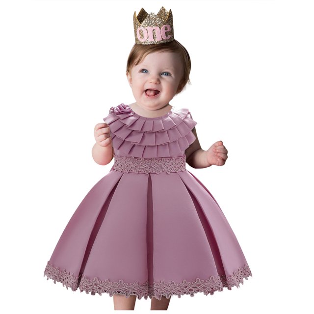 Wedding Dress for Girls Kids Girls Ruffled Princess Bridesmaid Pageant Gown Birthday Party Wedding Dress Party Dress for Girls Princess Dress for girls Birthday Dress. A sleeveless, ruffled lavender dress with an O-neck design, featuring intricate lace detailing at the waist and hem. Made of polyester with a solid pattern, suitable for ages 0-4 years. The dress is styled for special occasions like weddings, pageants, and birthday parties.