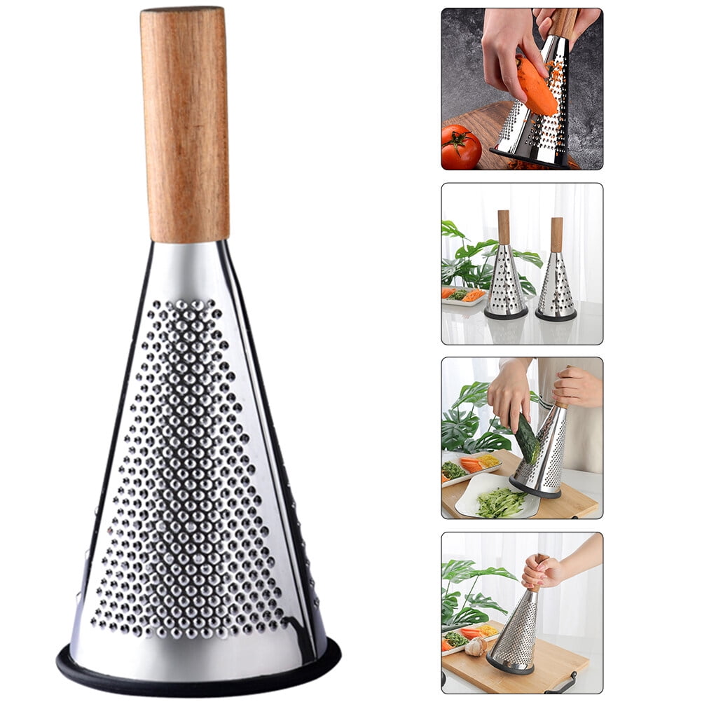 A cone shaped grater with a block of parmesan stock photo - OFFSET