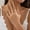 03 Golden Finger 4588, variant on Ornament Gothic Style Hollow Tapered Fingernail Cap Ring Niche Metal Tassel Ring