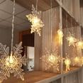 thumbnail image 2 of Snowflakes LED Curtain Lights Color Changing Snowflakes Fairy Lights, LED Snowflake Lights for Home, Church, Wedding, Birthday WARM-BATTERY, 2 of 5