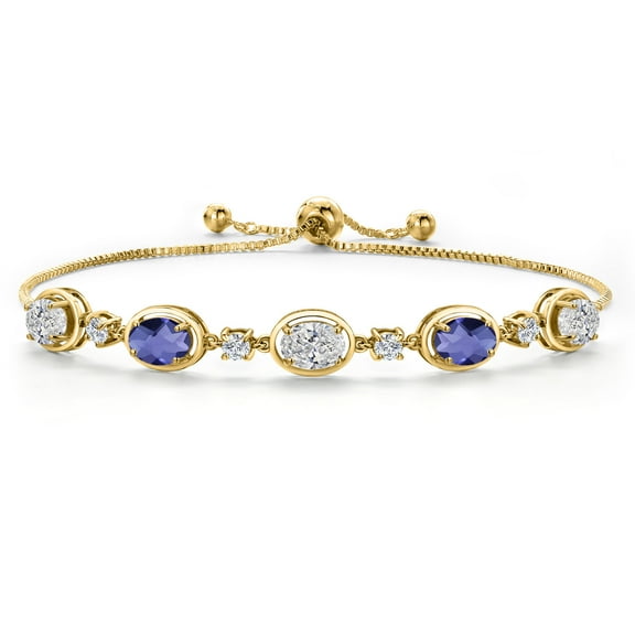 Gem Stone King 18K Yellow Gold Plated Silver White Lab Grown Diamond and Blue Iolite Bracelet for Women | 3.40 Cttw | Gemstone April Birthstone | Oval 7X5MM | Fully Adjustable 9 inch